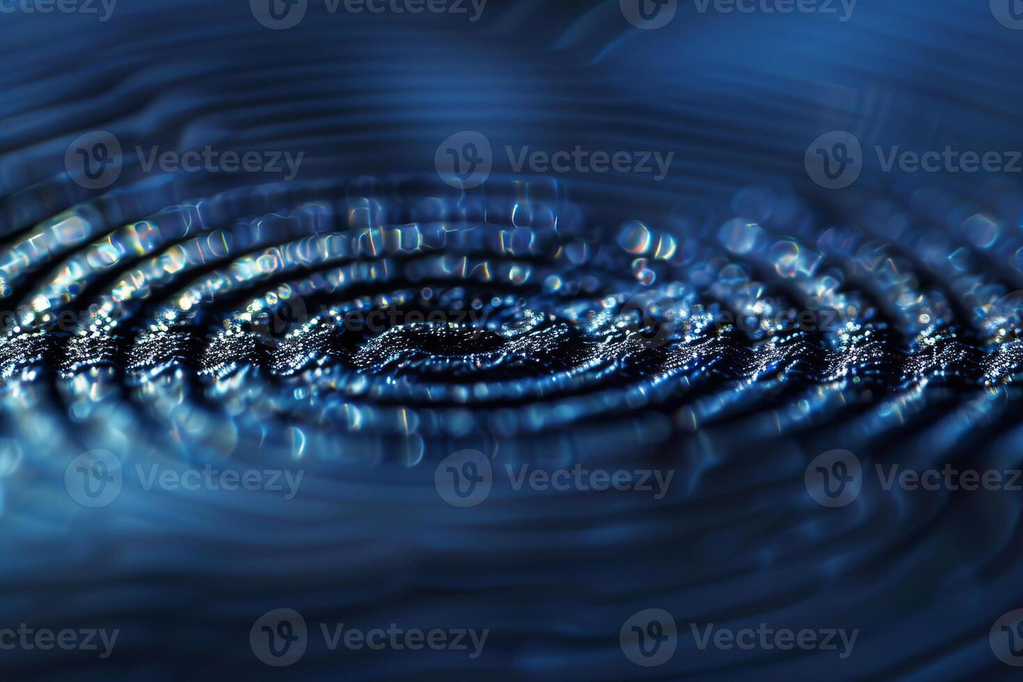 Abstract blue concentric ripples spreading outward from center photo