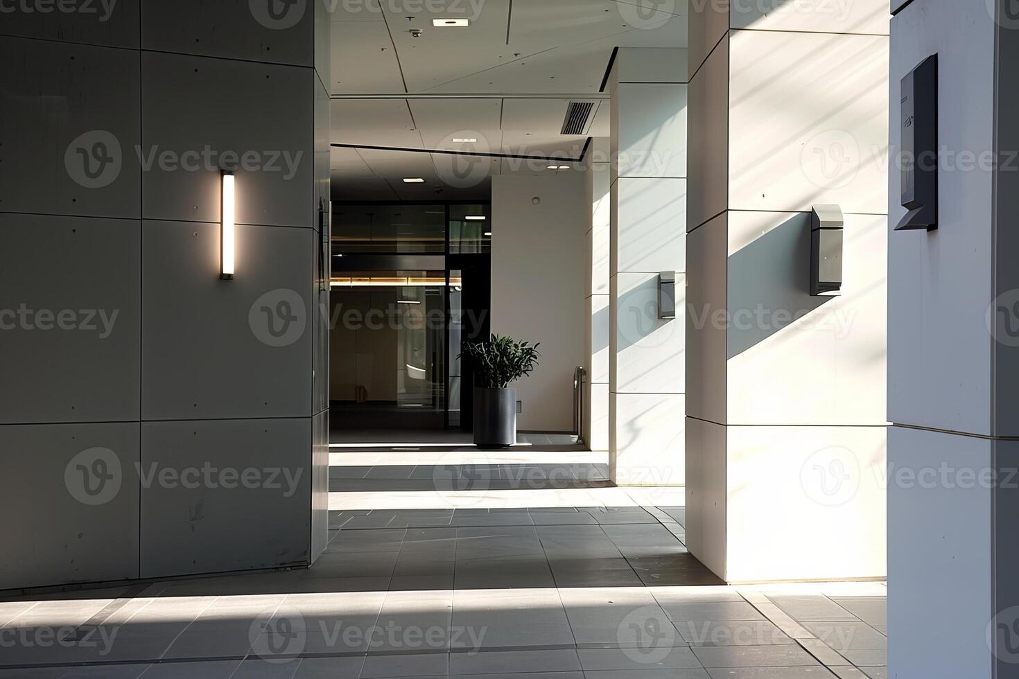 Sunlight illuminating empty modern office building corridor photo