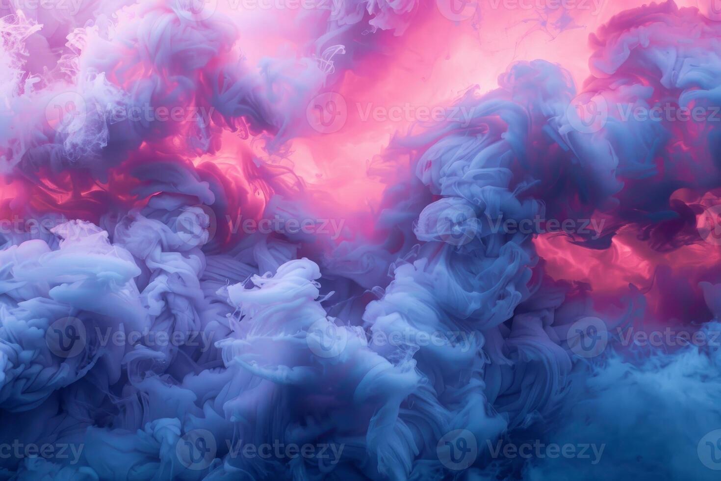 Colorful ink mixing in water creating abstract shapes photo