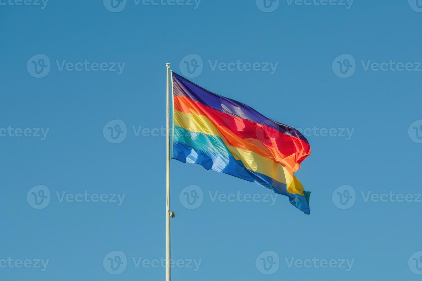 The progress pride flag is waving in the wind photo