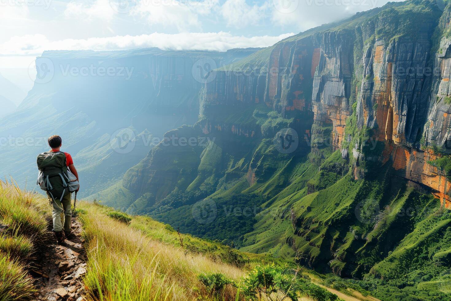 Hiker is enjoying a challenging trek through a beautiful valley photo