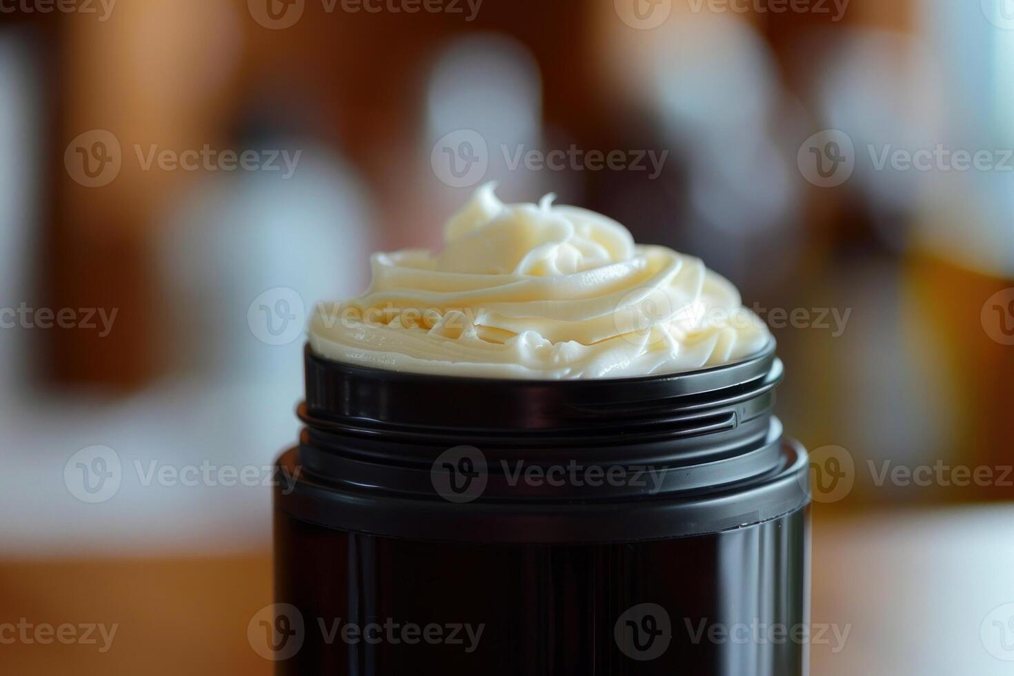 Skincare product being opened revealing its rich texture photo