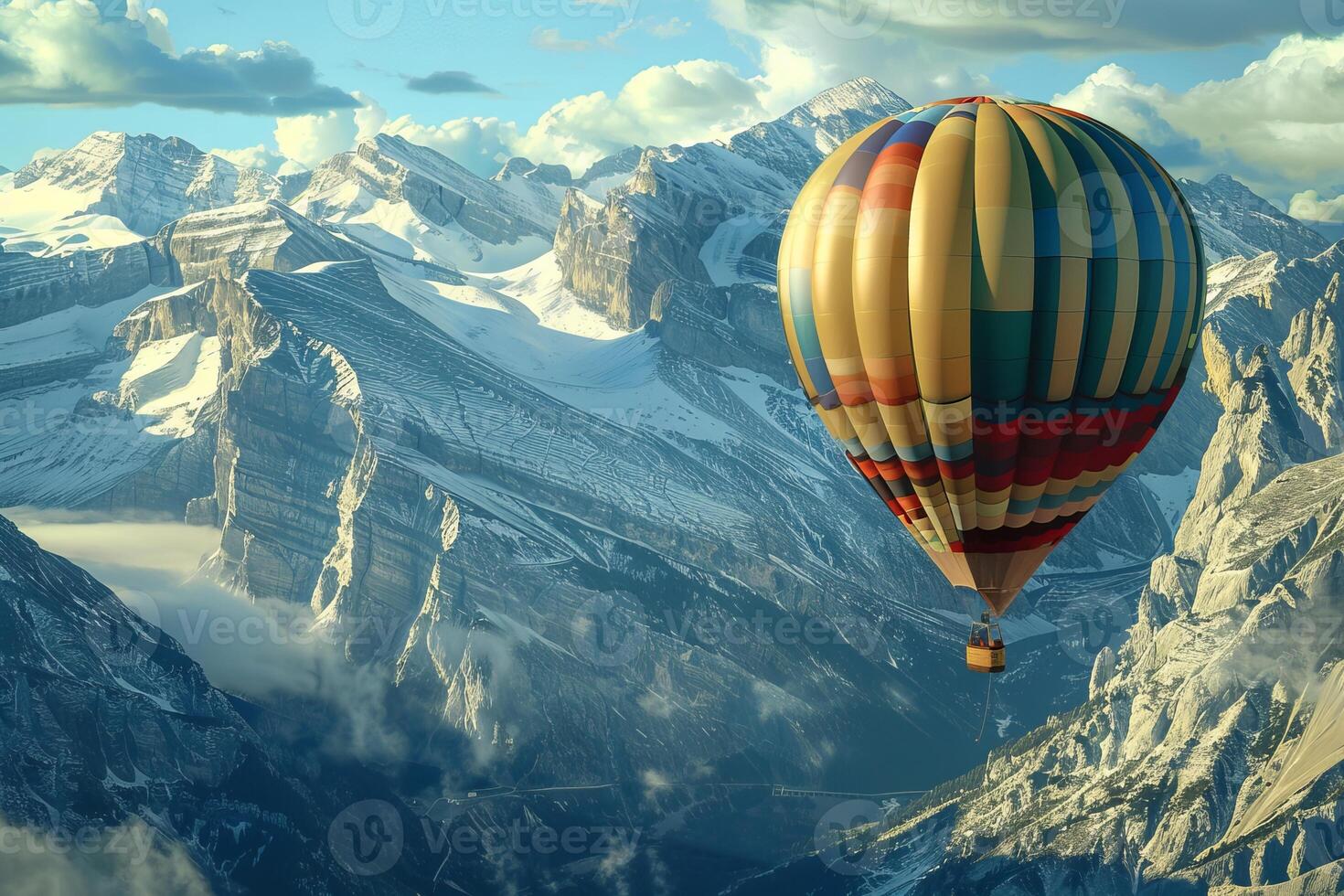 Colorful hot air balloon flying over the snowy rocky mountains photo