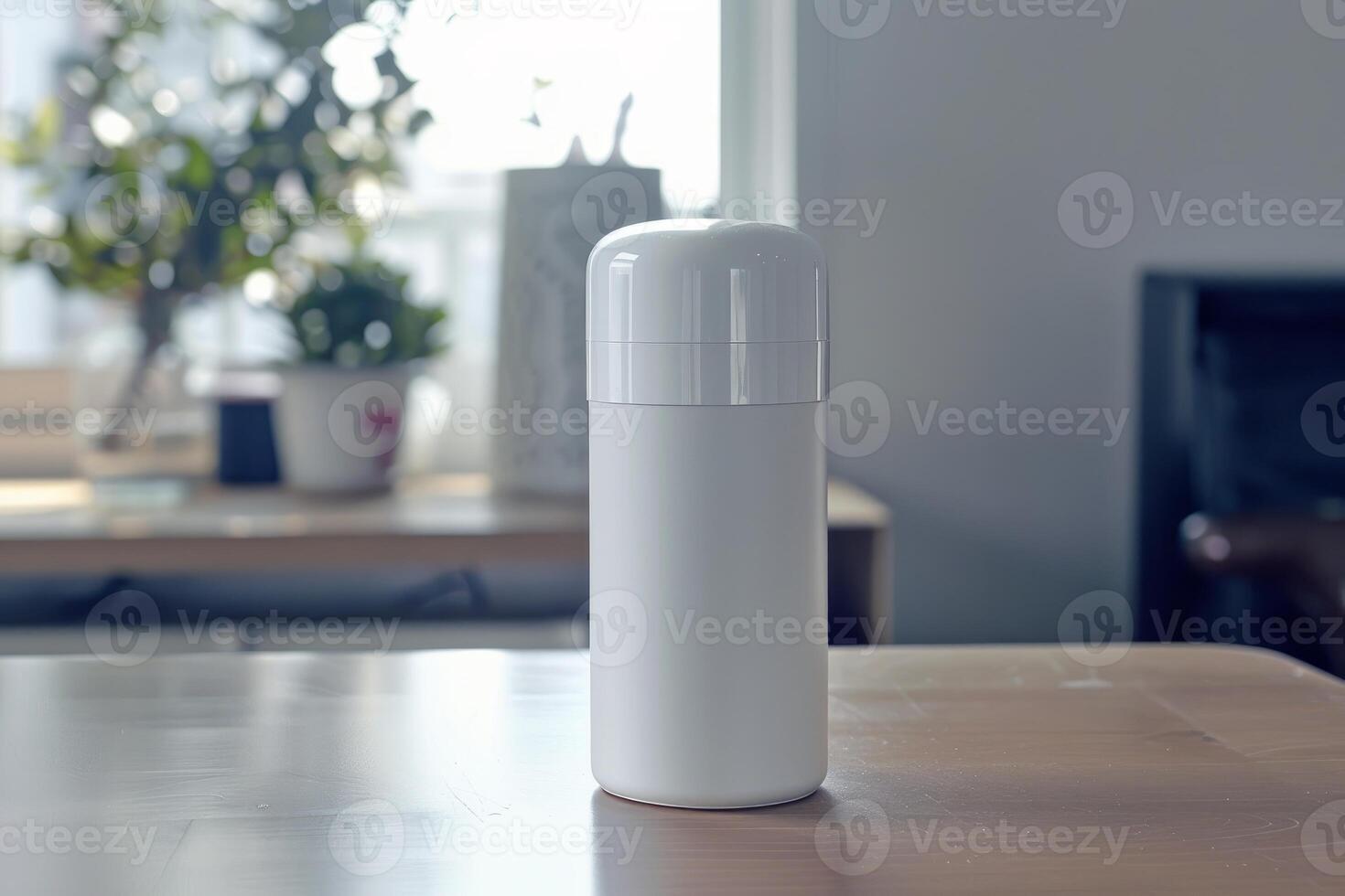White reusable bottle standing on a wooden table photo