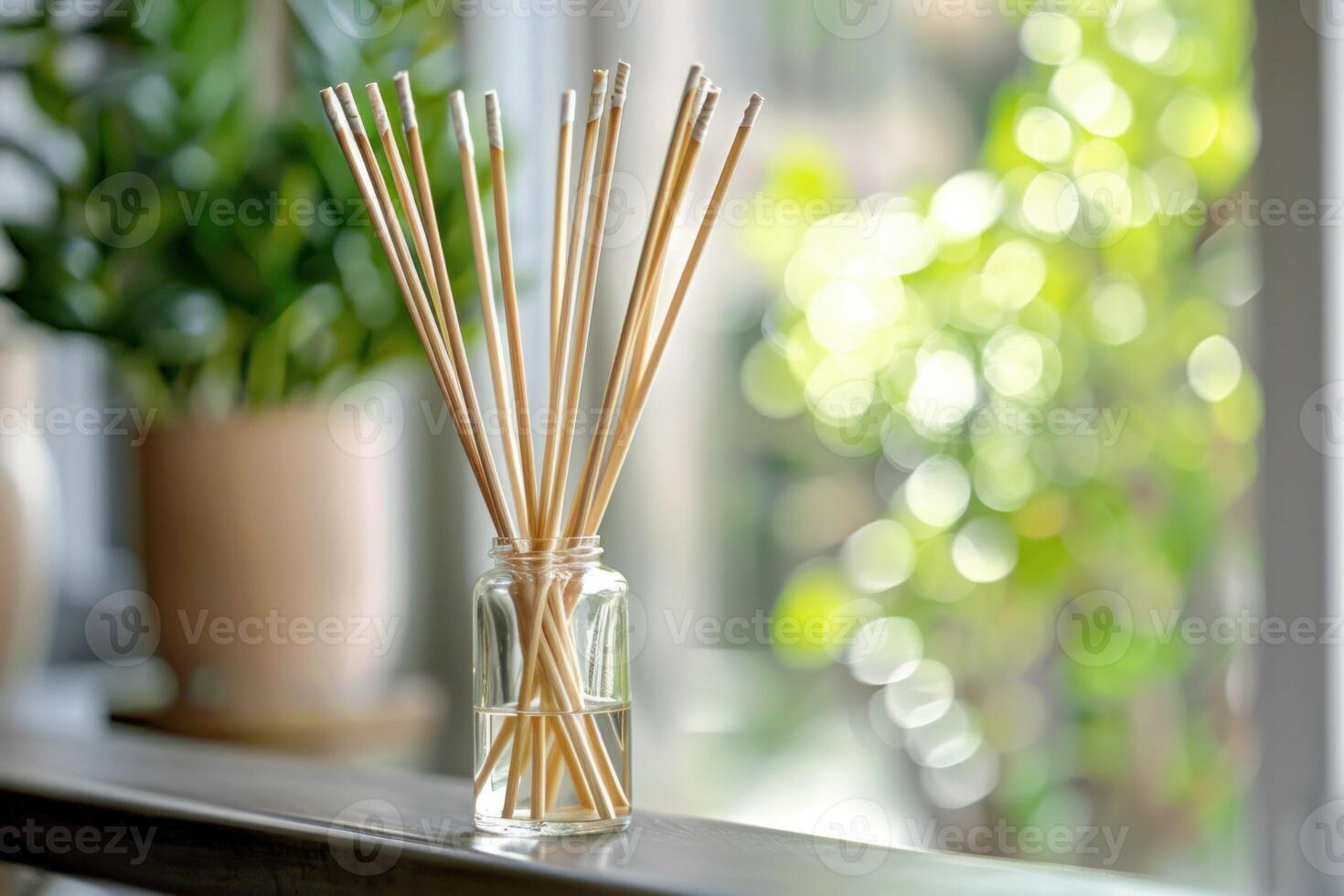 Aromatic reed diffuser spreading pleasant scent in a cozy home photo