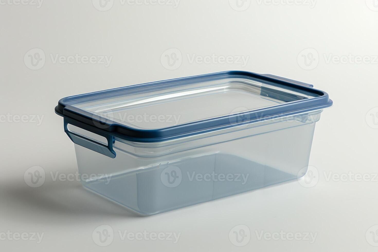 Empty rectangular plastic food container with blue lid isolated on white background photo