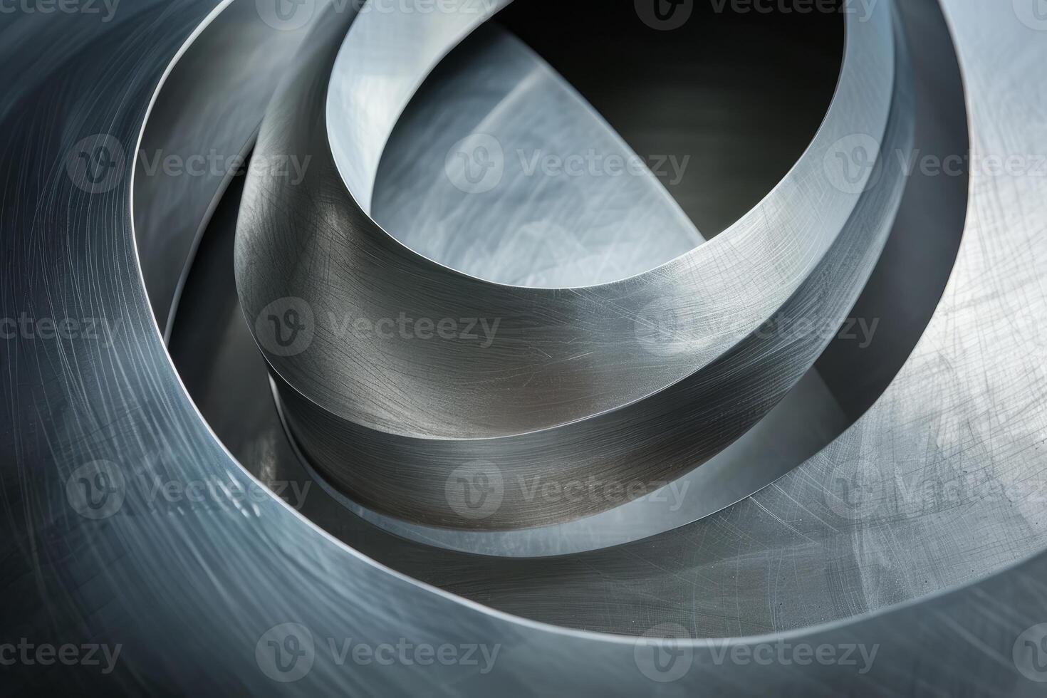 Brushed metal forming abstract spiral shapes photo
