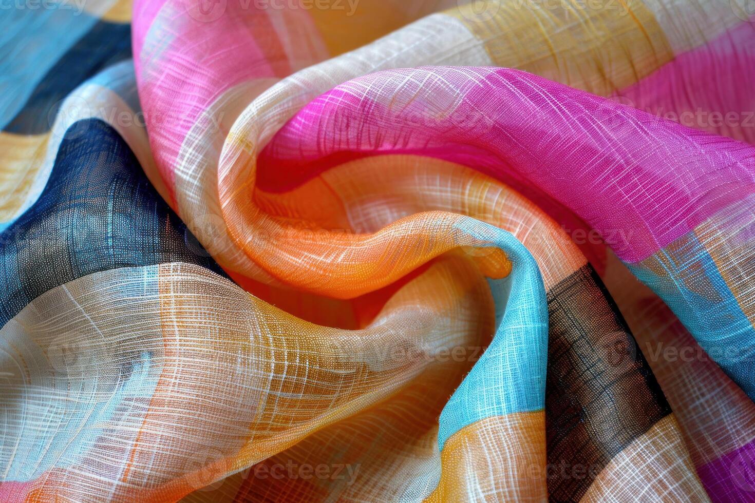 Close up of colorful silk fabric flowing and folding photo