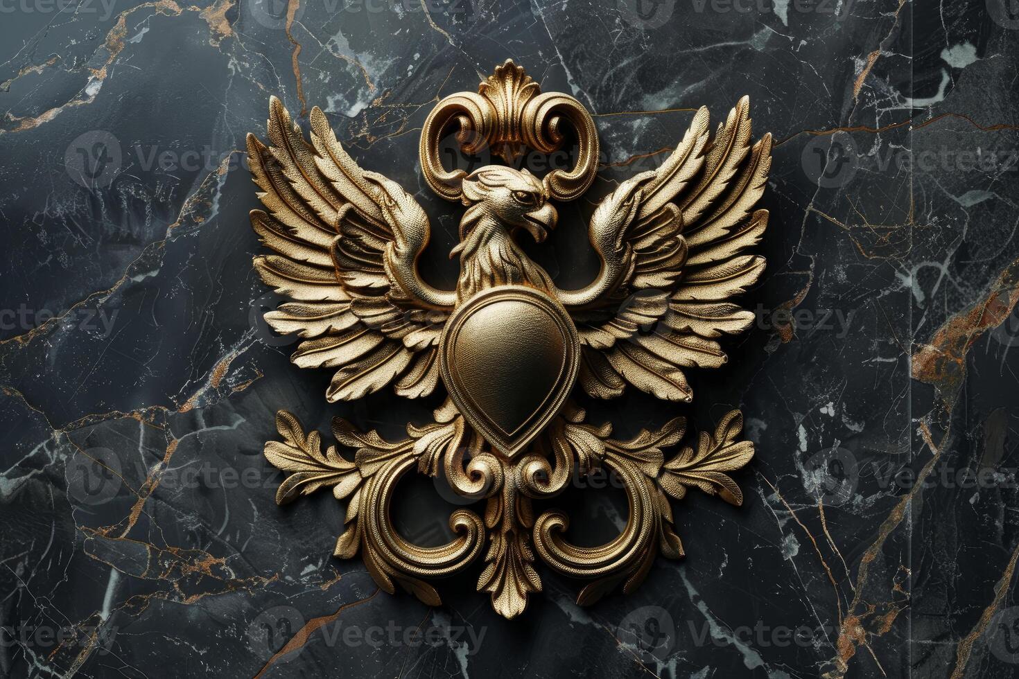 Golden eagle sculpture with shield on black marble background photo