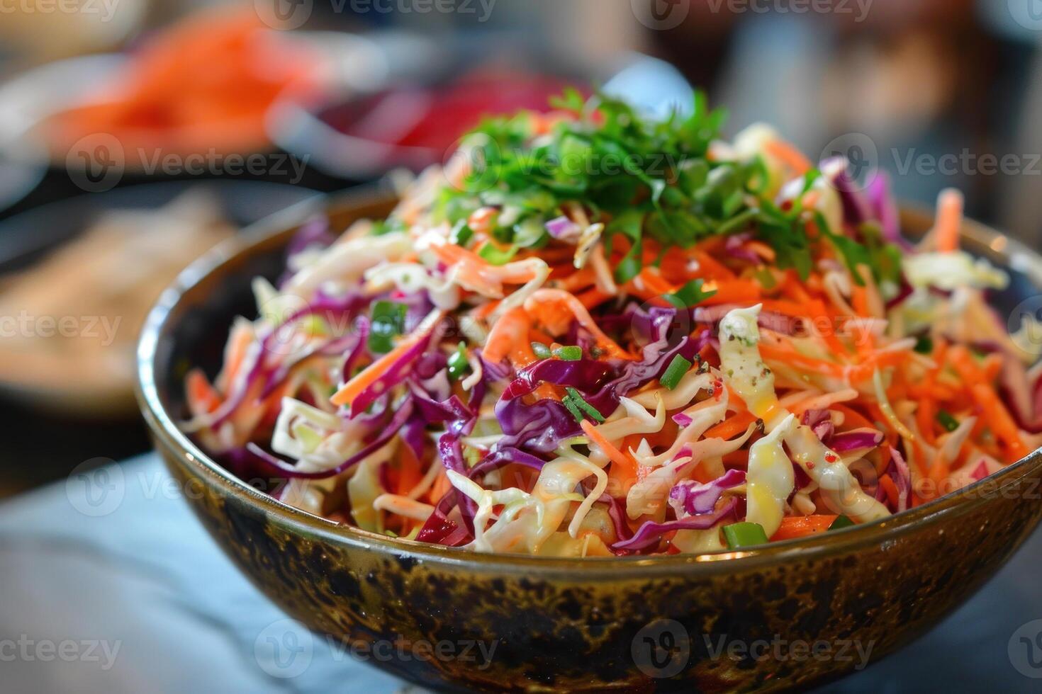 Coleslaw salad with shredded red and white cabbage in bowl photo