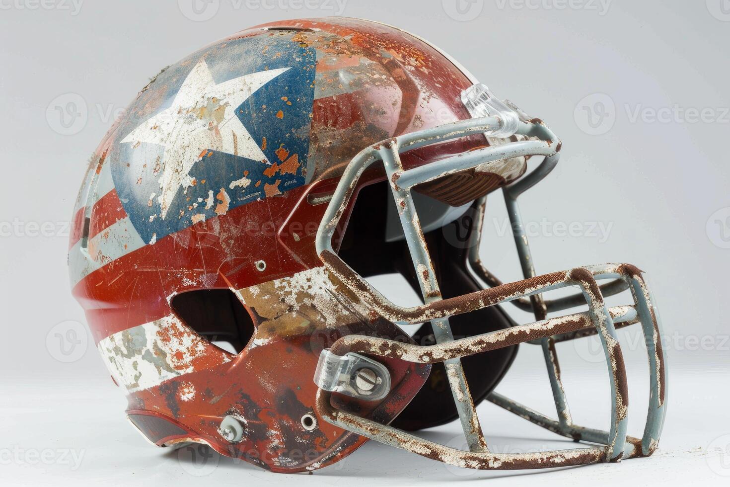 Old rusty american football helmet showing stars and stripes photo