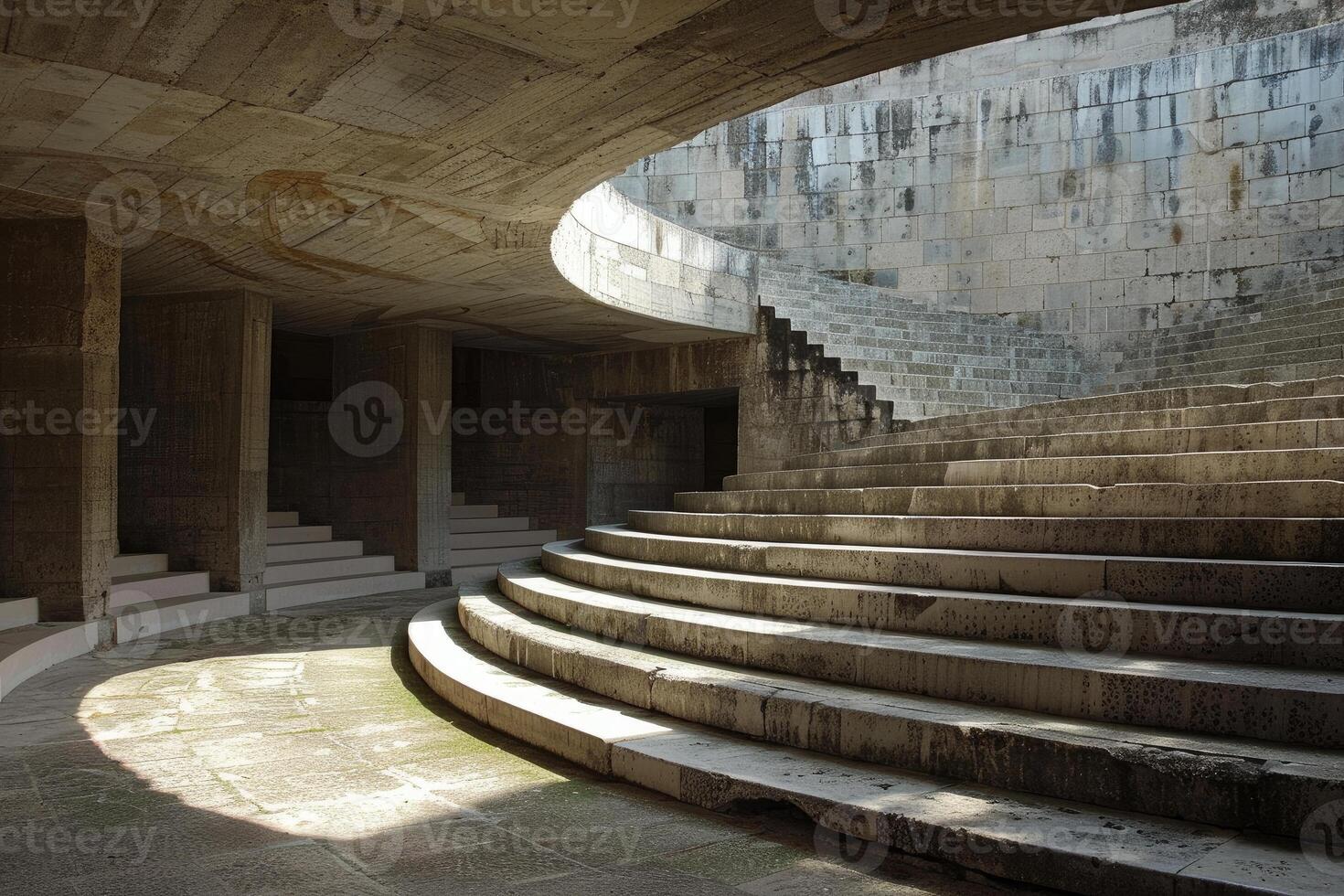 Modern architecture featuring stone steps leading to open circular area photo