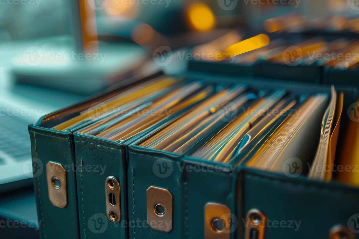 Full ring binders standing upright holding important documents photo