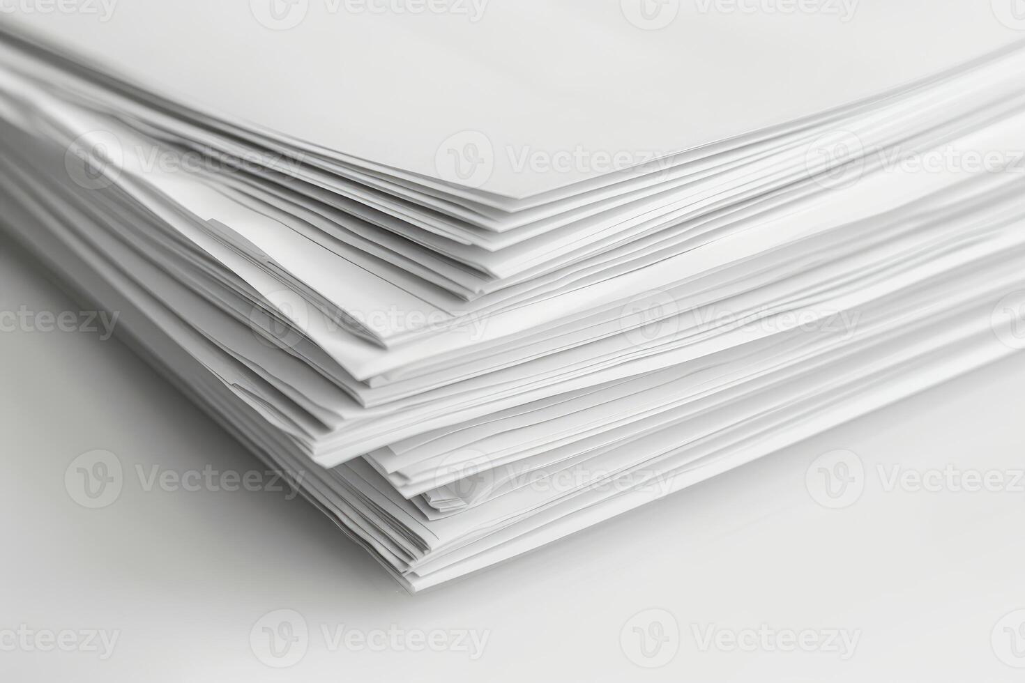 Stack of papers creating abstract geometric composition photo