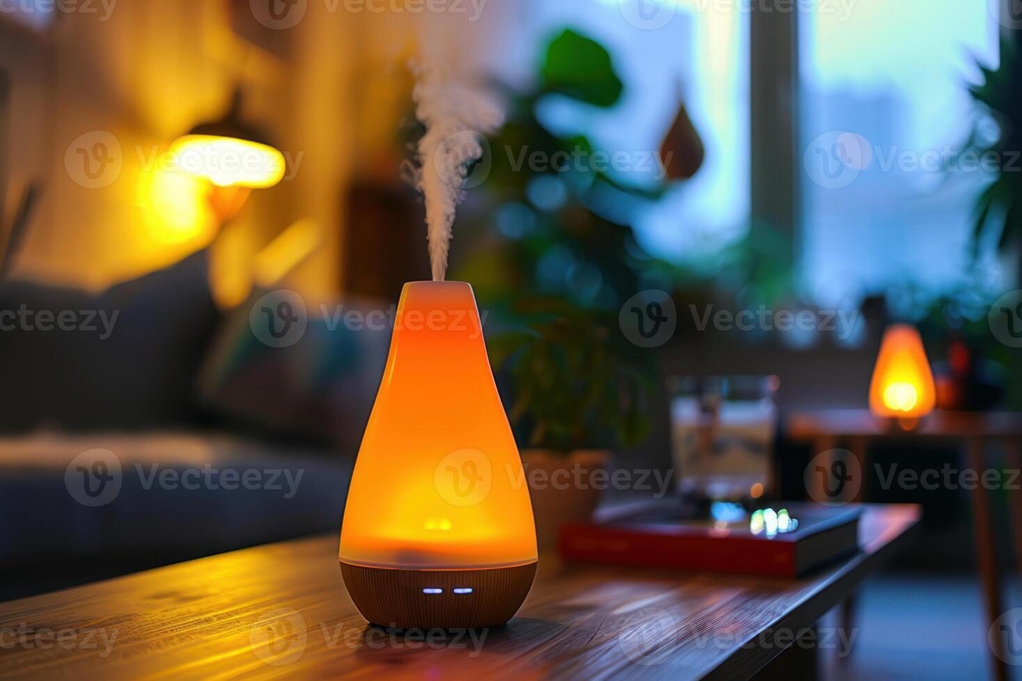 Modern essential oil diffuser spreading relaxing fragrance in living room photo