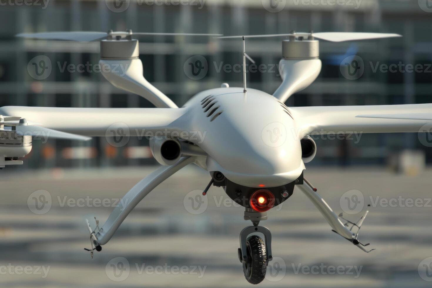 Modern surveillance drone hovering at the airport photo