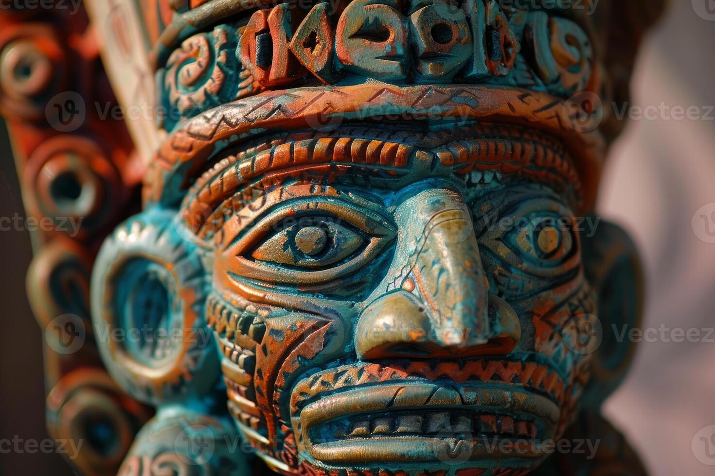 Mayan statue depicting god posing with neutral expression photo