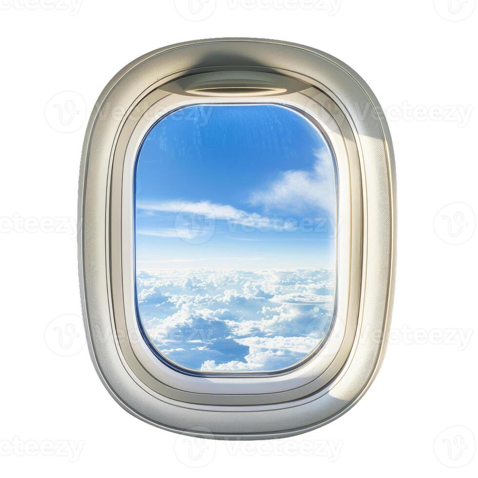 Airplane window showing blue sky with clouds during flight photo