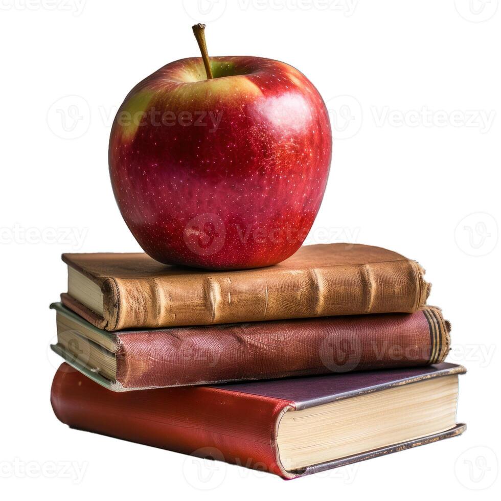 Red apple resting on stack of old books symbolizing knowledge photo