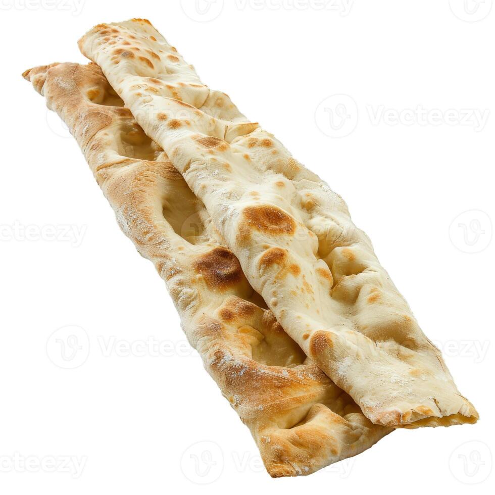 Two pieces of flatbread layered on white background photo