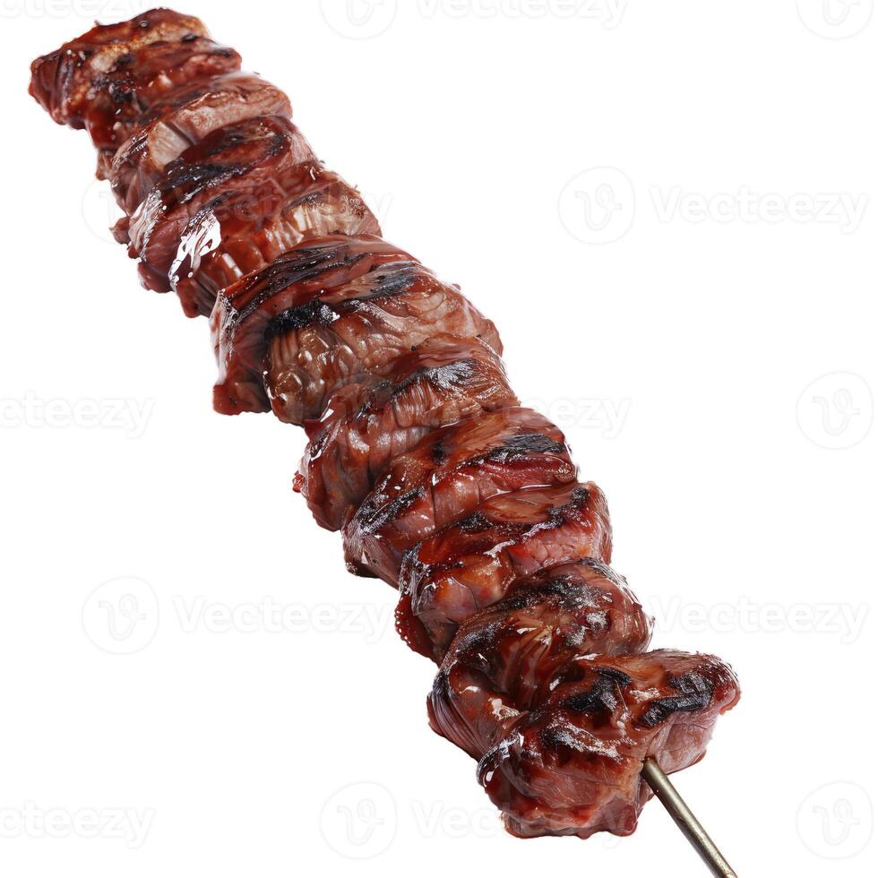 Barbecue beef shish kebab skewers being grilled on white background photo