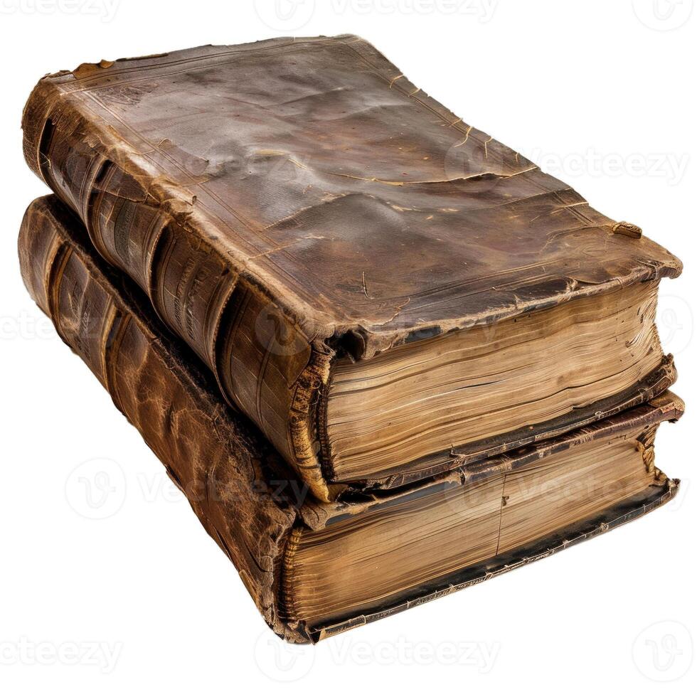 Two antique books with cracked leather covers laying on top of each other photo