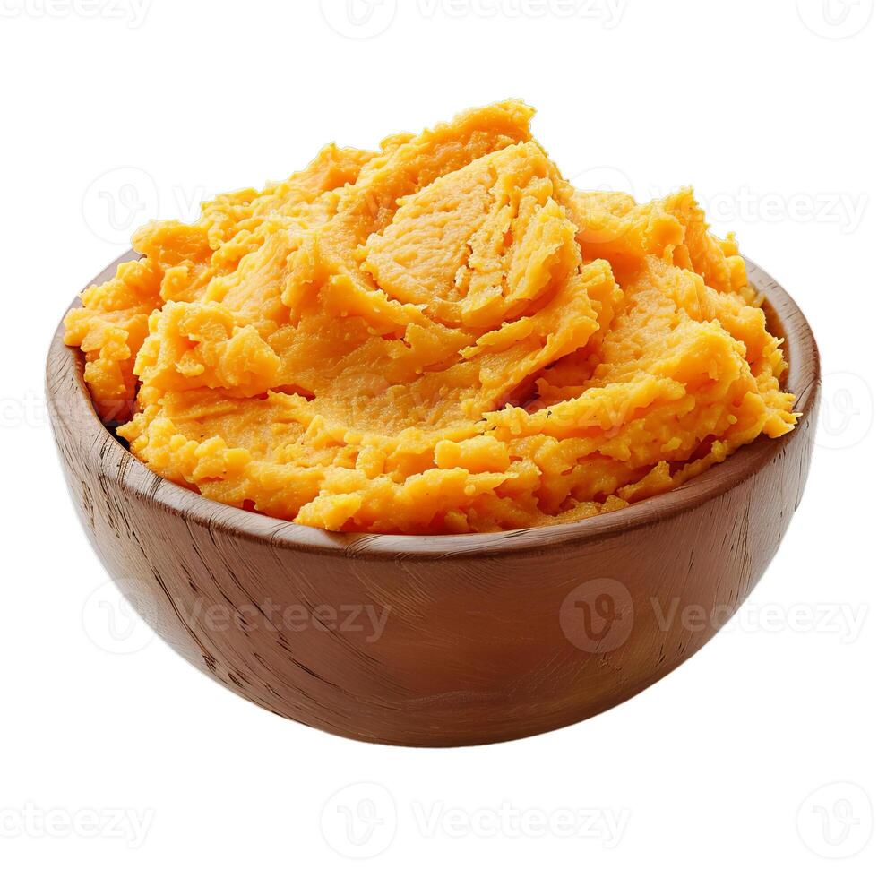 Sweet potato mash in wooden bowl on white background photo