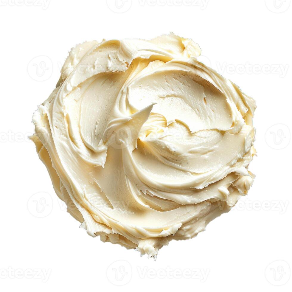 Creamy swirl of white chocolate frosting isolated on white background photo