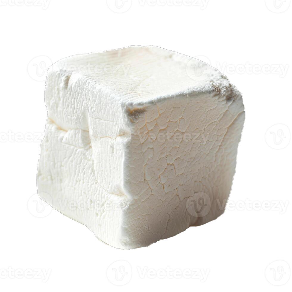 Single white marshmallow with cracked surface on white background photo