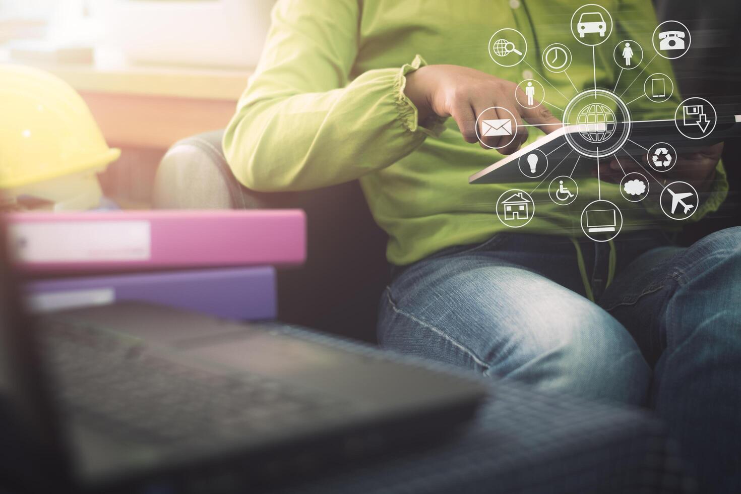 Businesswoman in casual dress holding tablet with online while making orders with virtual icon diagram. photo