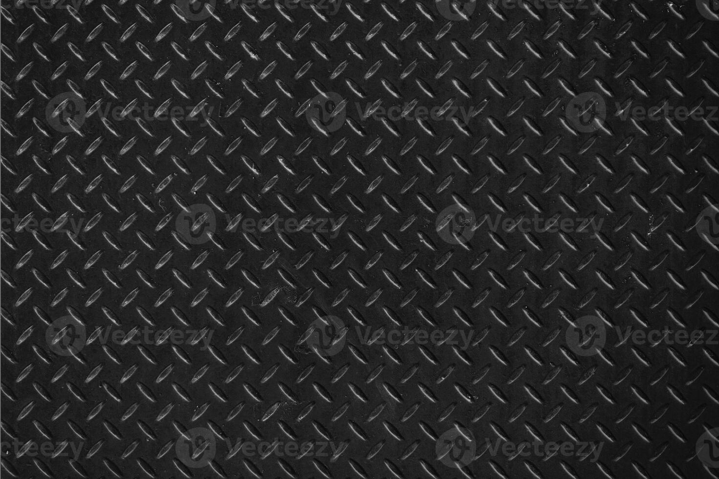 Black Metal Diamond Plate Texture Background. photo