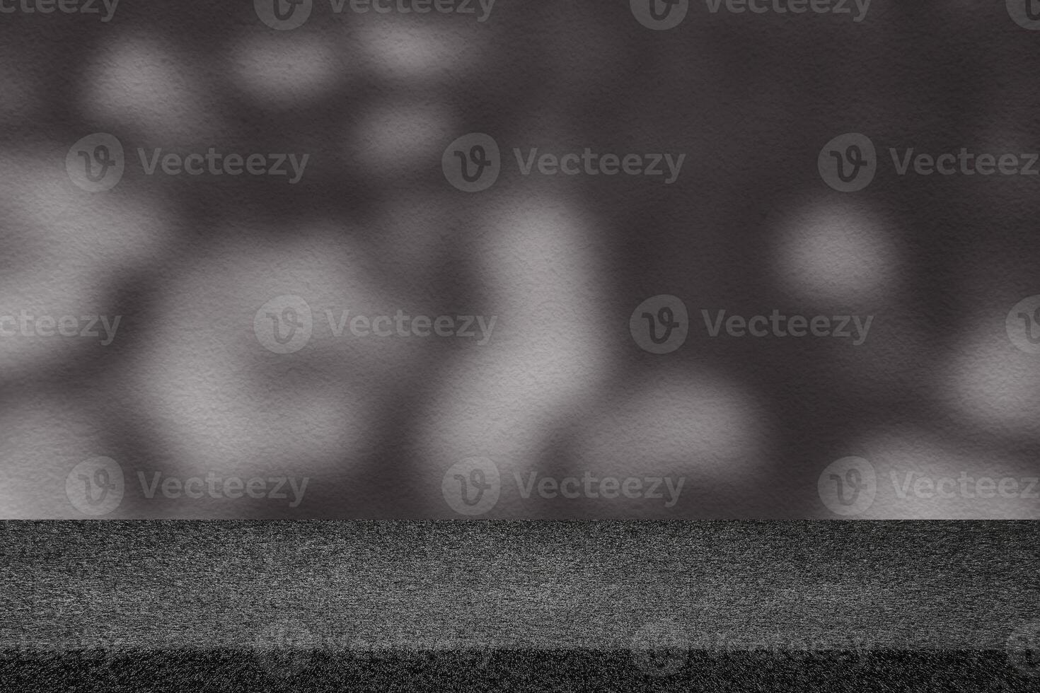 Concrete Table with Scary Tree Shadow on Concrete Wall Texture Background in Dark Tone photo