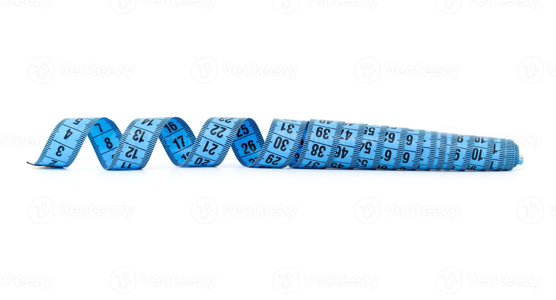 Close-up of blue measuring tape isolated on white background showcasing numbers photo