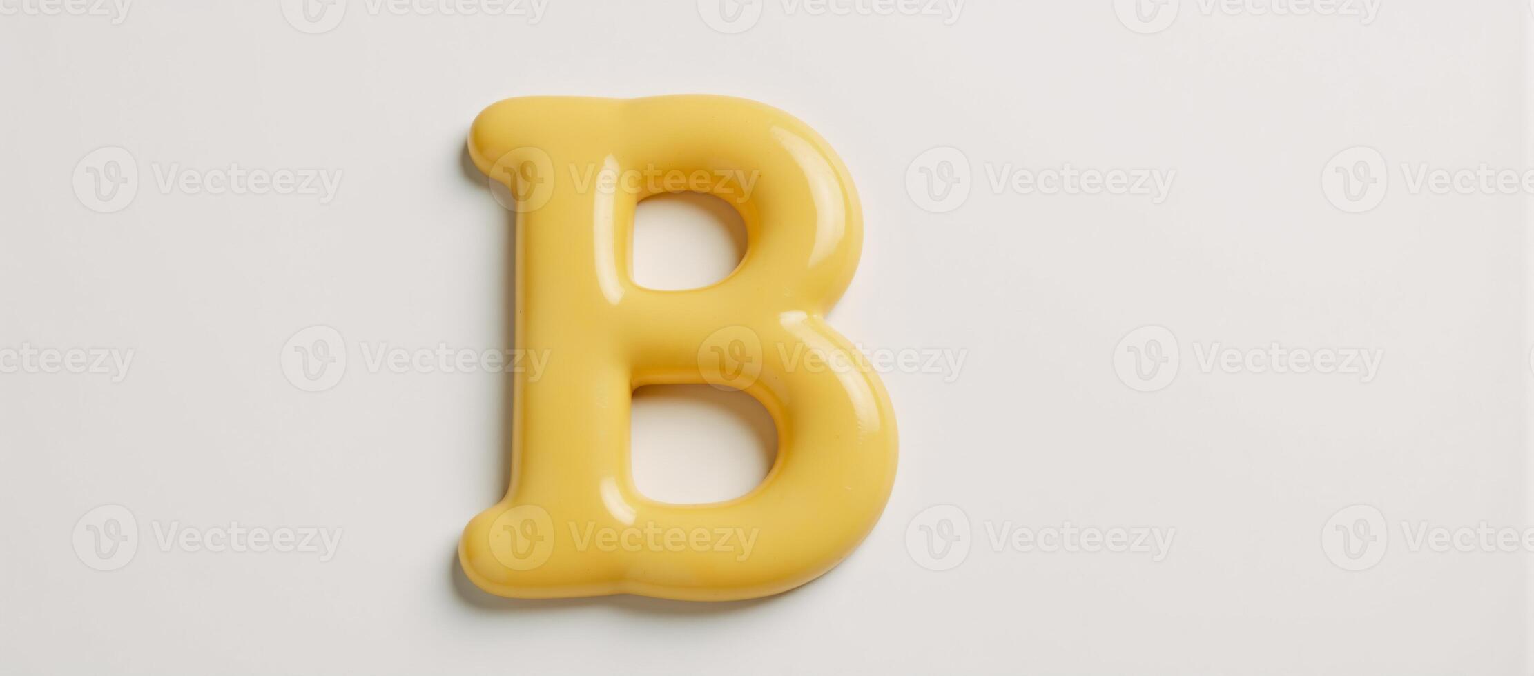 Isolated letter B crafted from melted butter against a plain background photo
