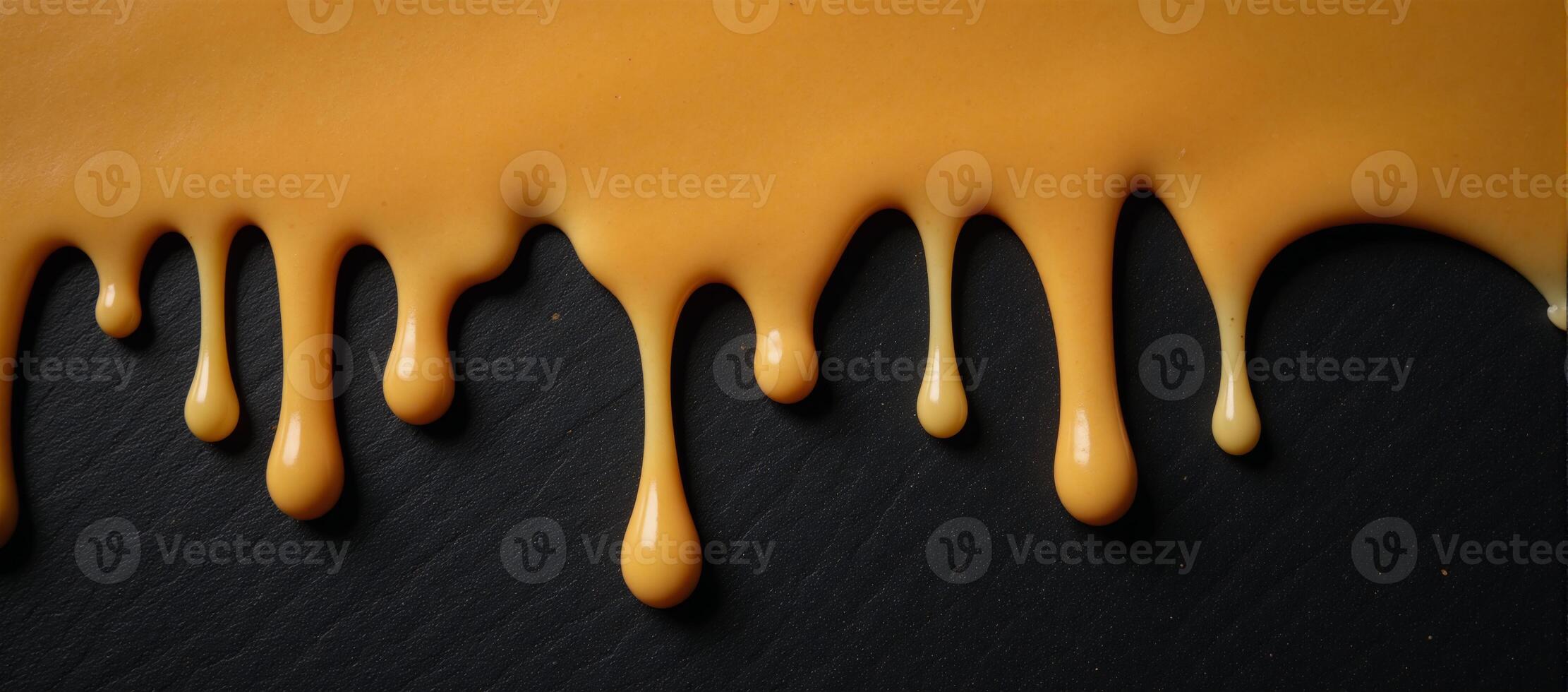 Melted cheese patterns on textured background photo