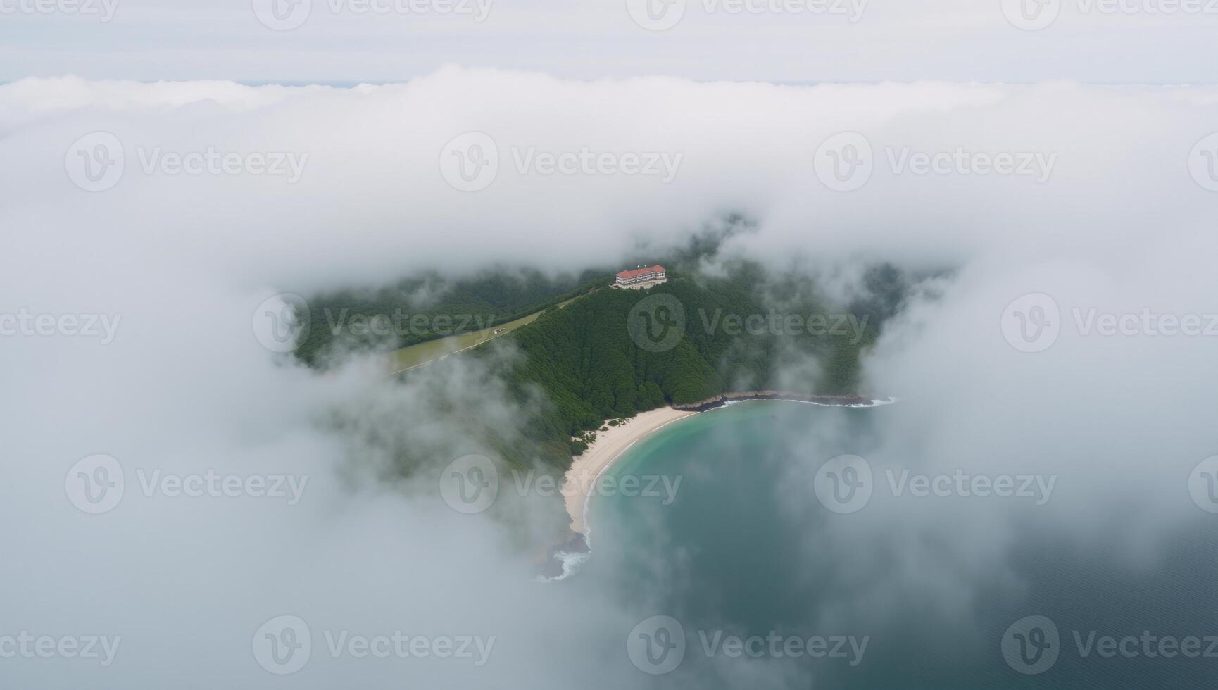 Overview of serene island shrouded in fog calm tranquil photo