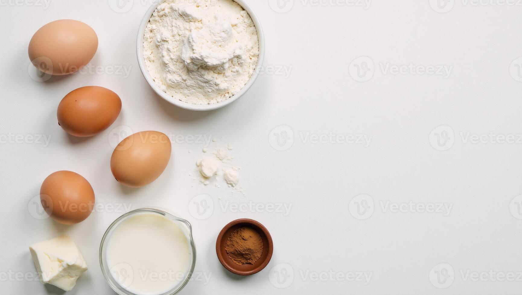 Topdown view Baking essentials eggs flour milk cottage cheese arranged against a textured white backdrop with ample room for copy photo