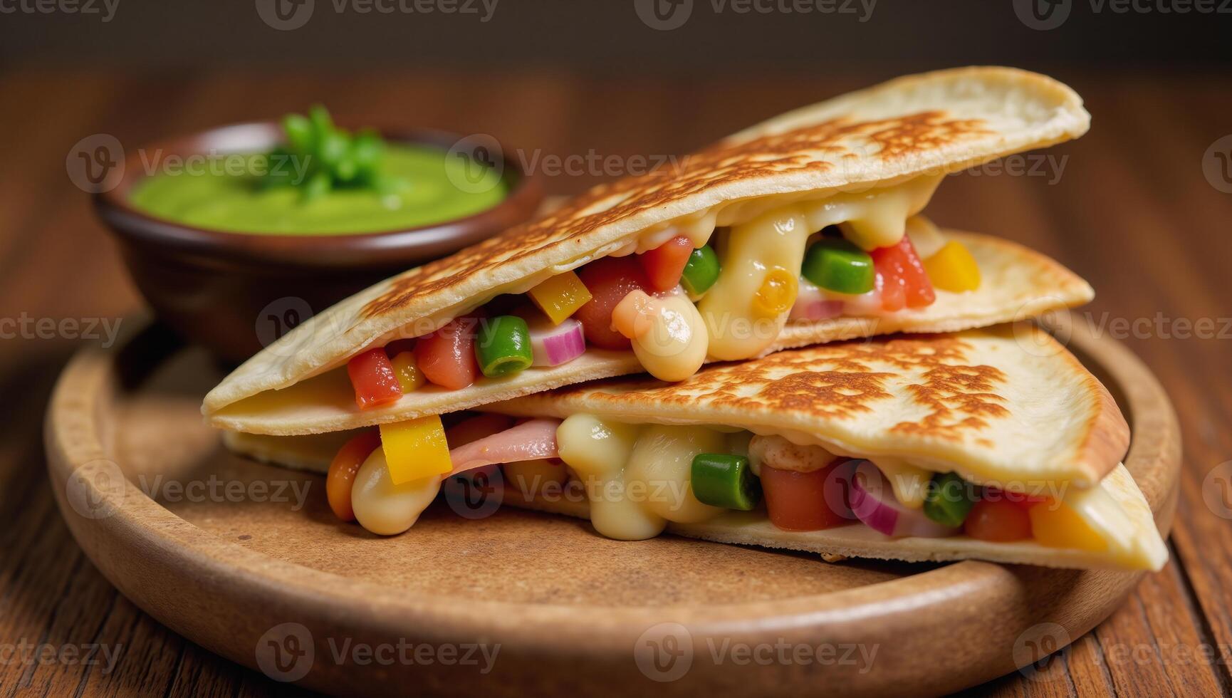 Cheese vegetable quesadillas served with salsa on a rustic table photo
