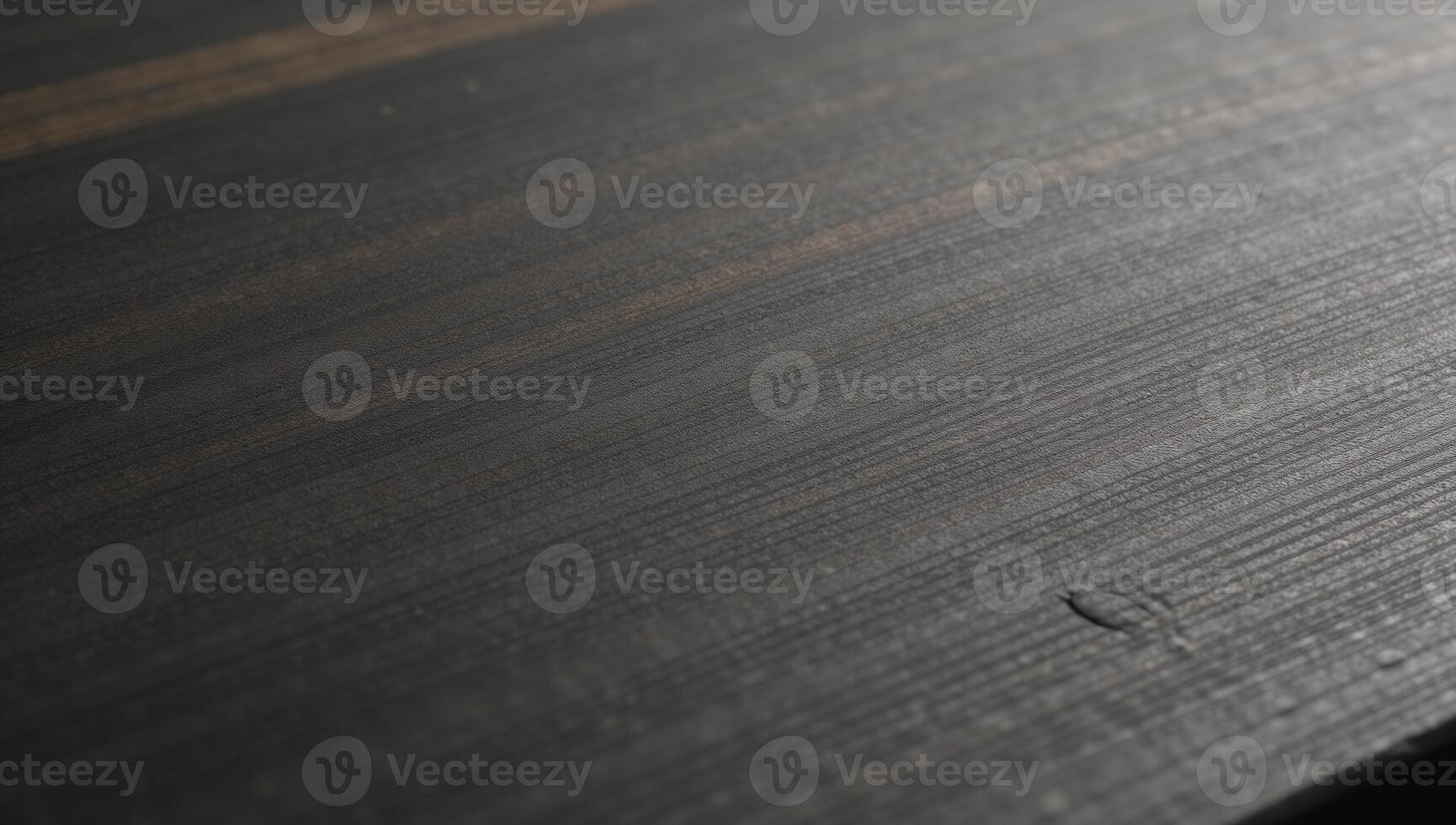 A worn textured gray chopping board with rustic appeal and noticeable scratches photo