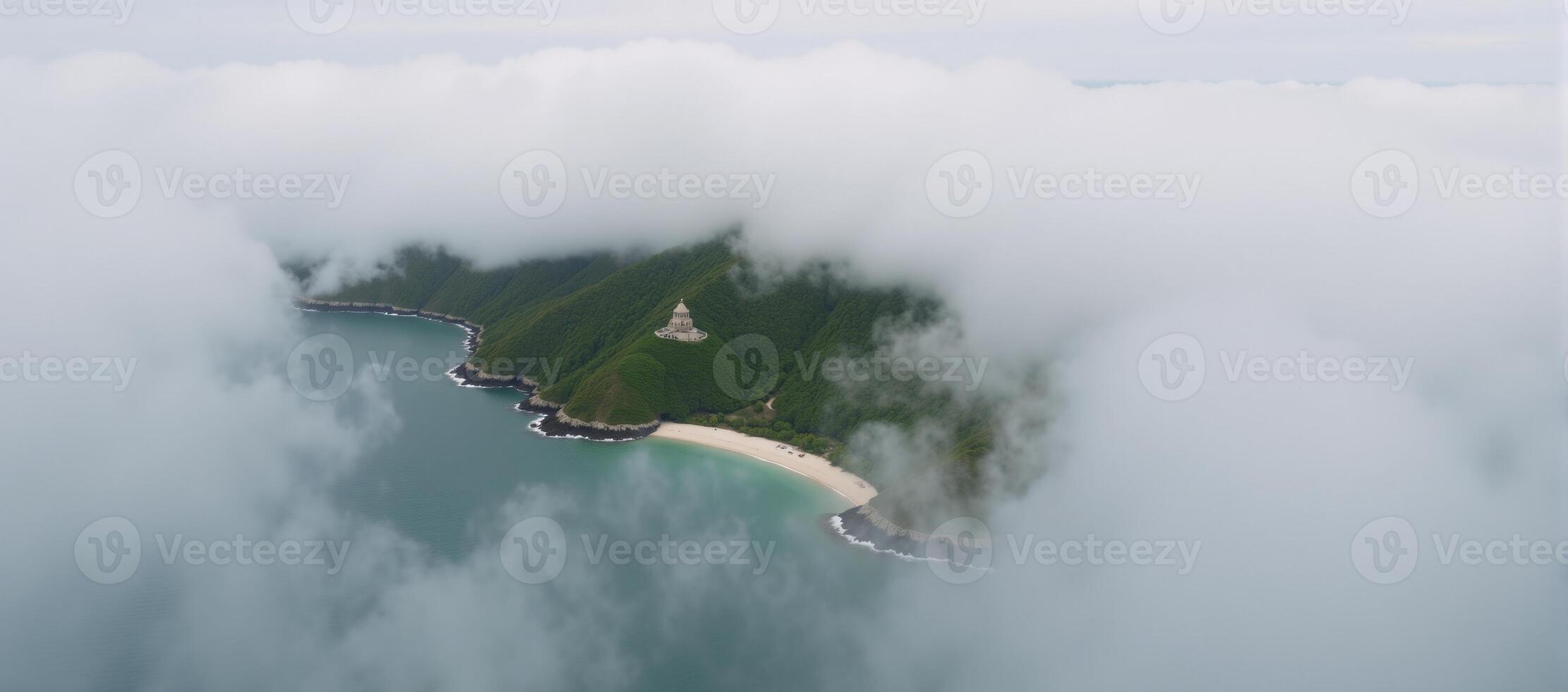 Overview of serene island shrouded in fog calm tranquil photo