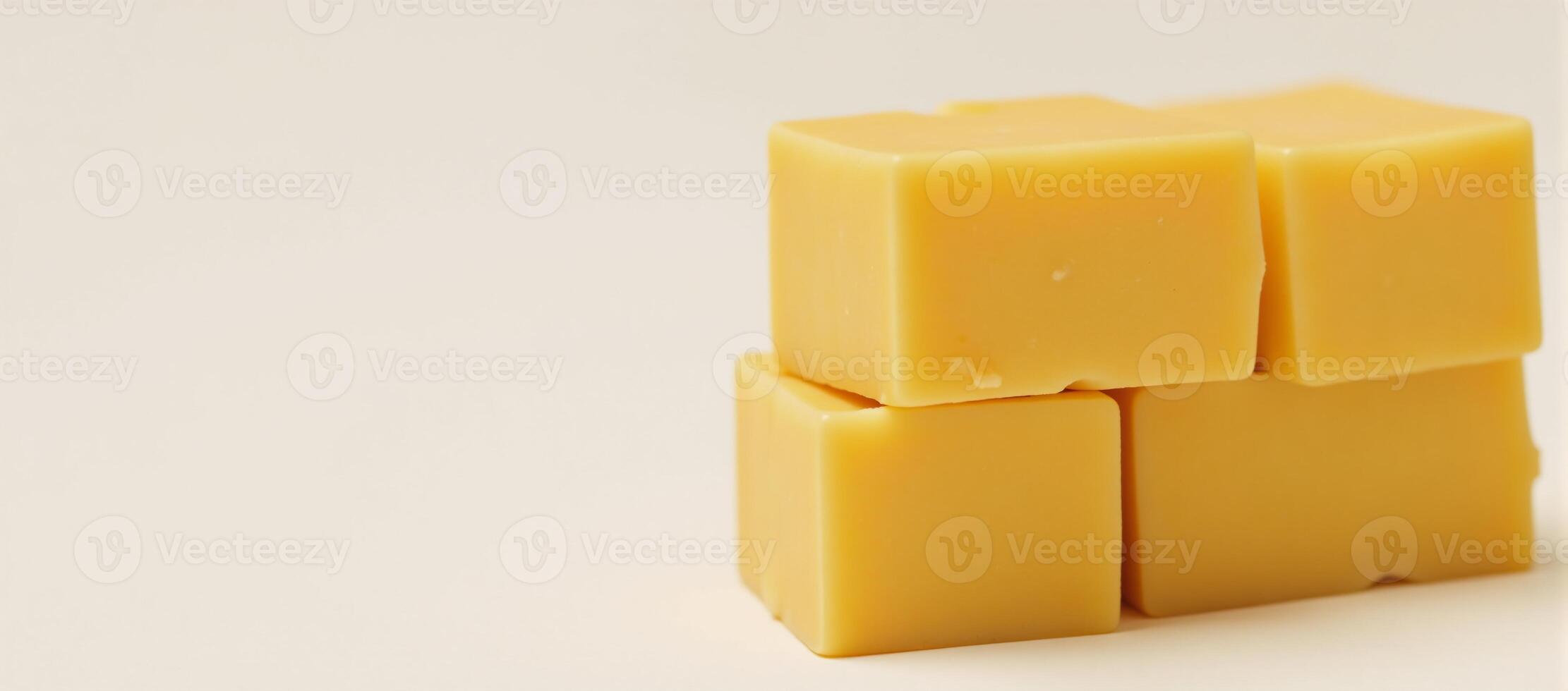 Cubed cheddar dairy cheese portion concise description for block cheese with cubed yellow cheddar pieces photo