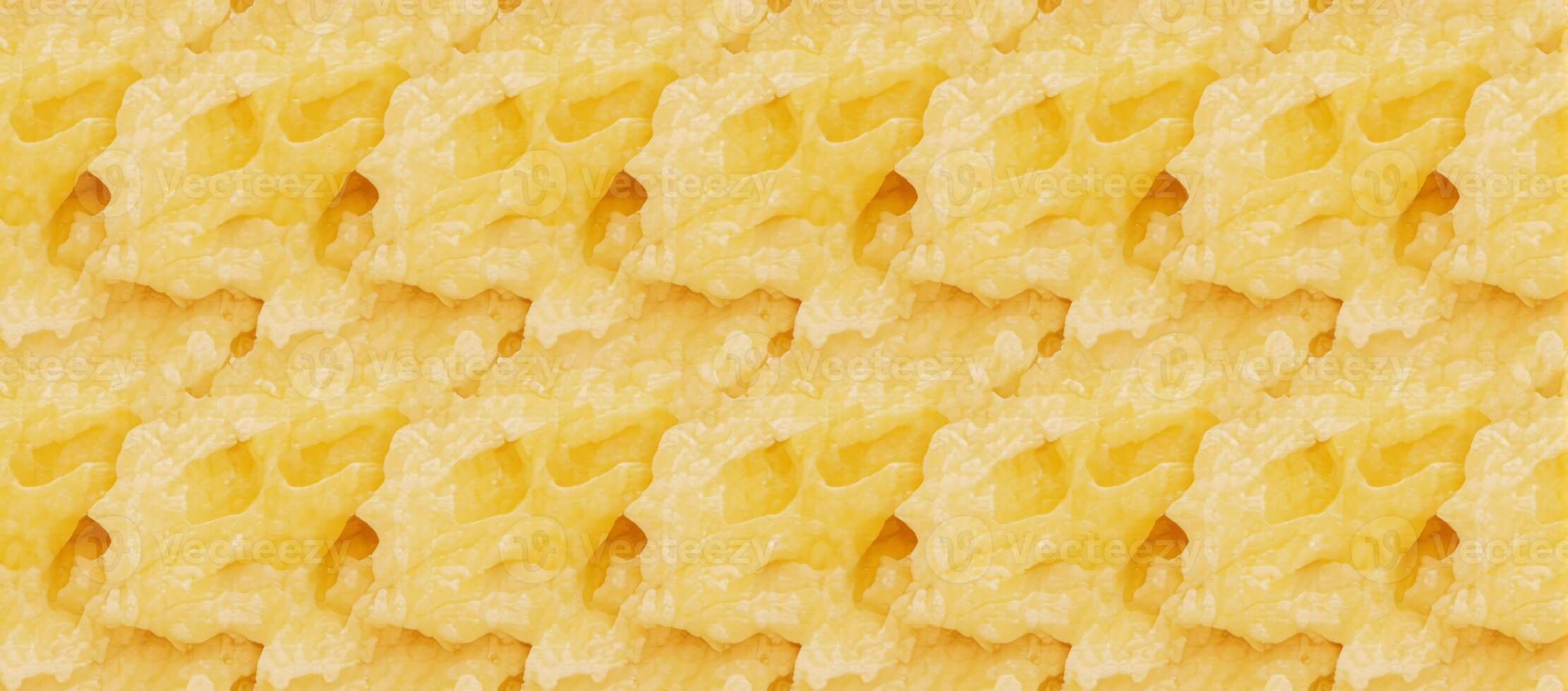 Intricate design showcasing repeated imagery of cheese slices forming an aesthetically pleasing pattern on a surface photo