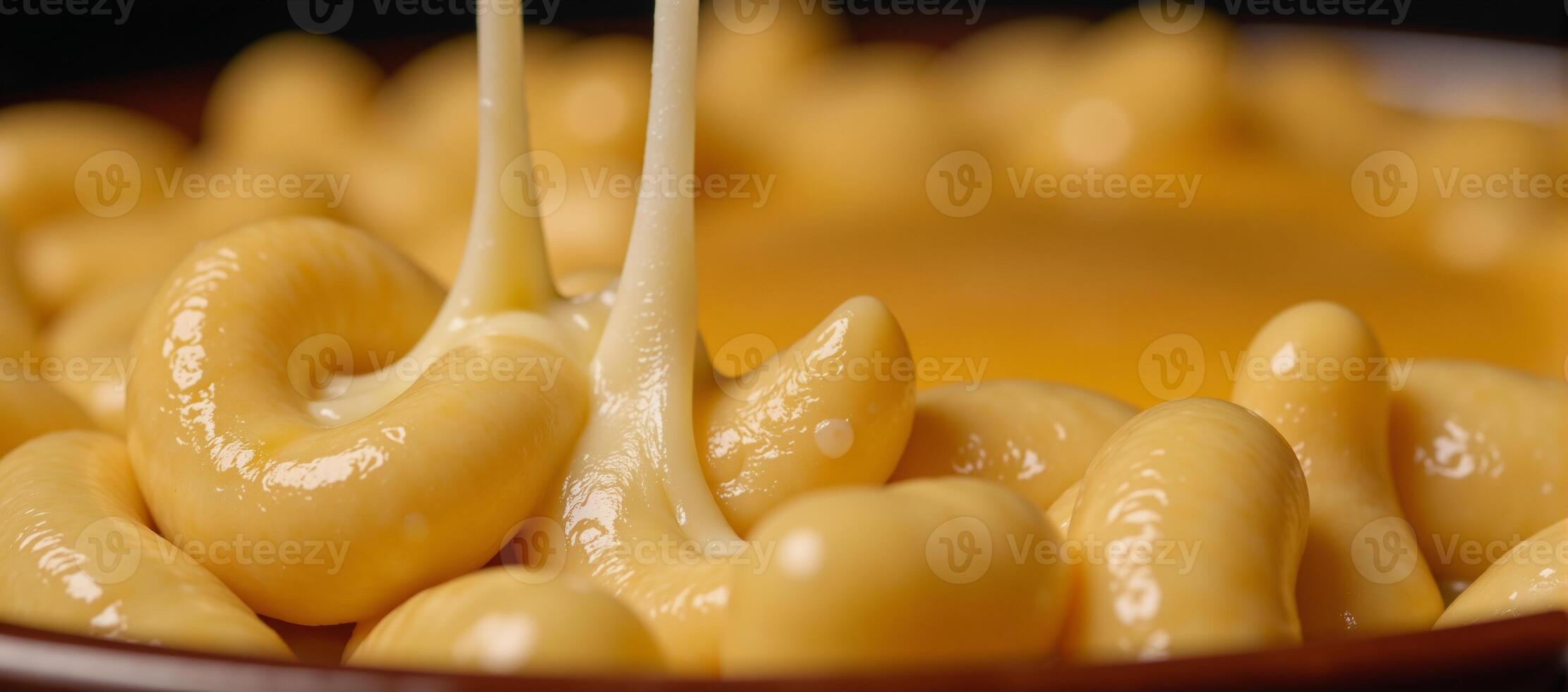 Detailed closeup of macaroni and cheese texture on macro scale photo