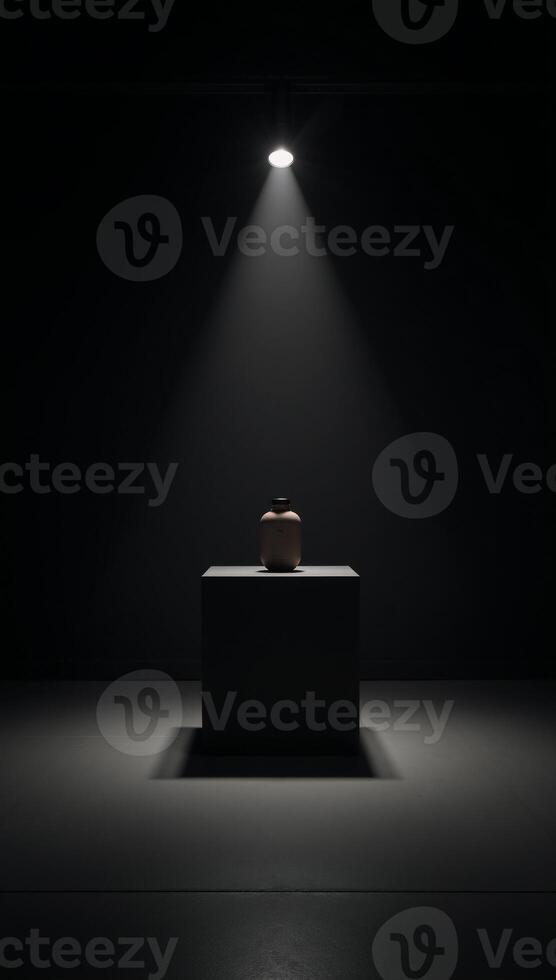 A darkened studio gallery highlights an abstract product showcased within an empty textured room setting photo