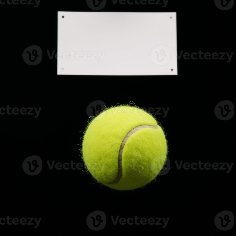 Yellow tennis ball soaring into blackbacked tennis net banner with empty area for text photo