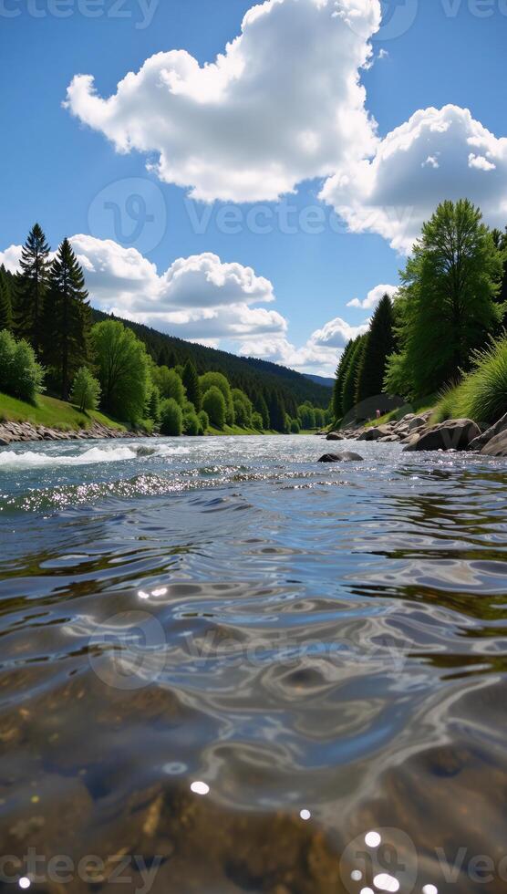 Stunning serene river scene under bright blue skies dotted with cottonlike clouds photo