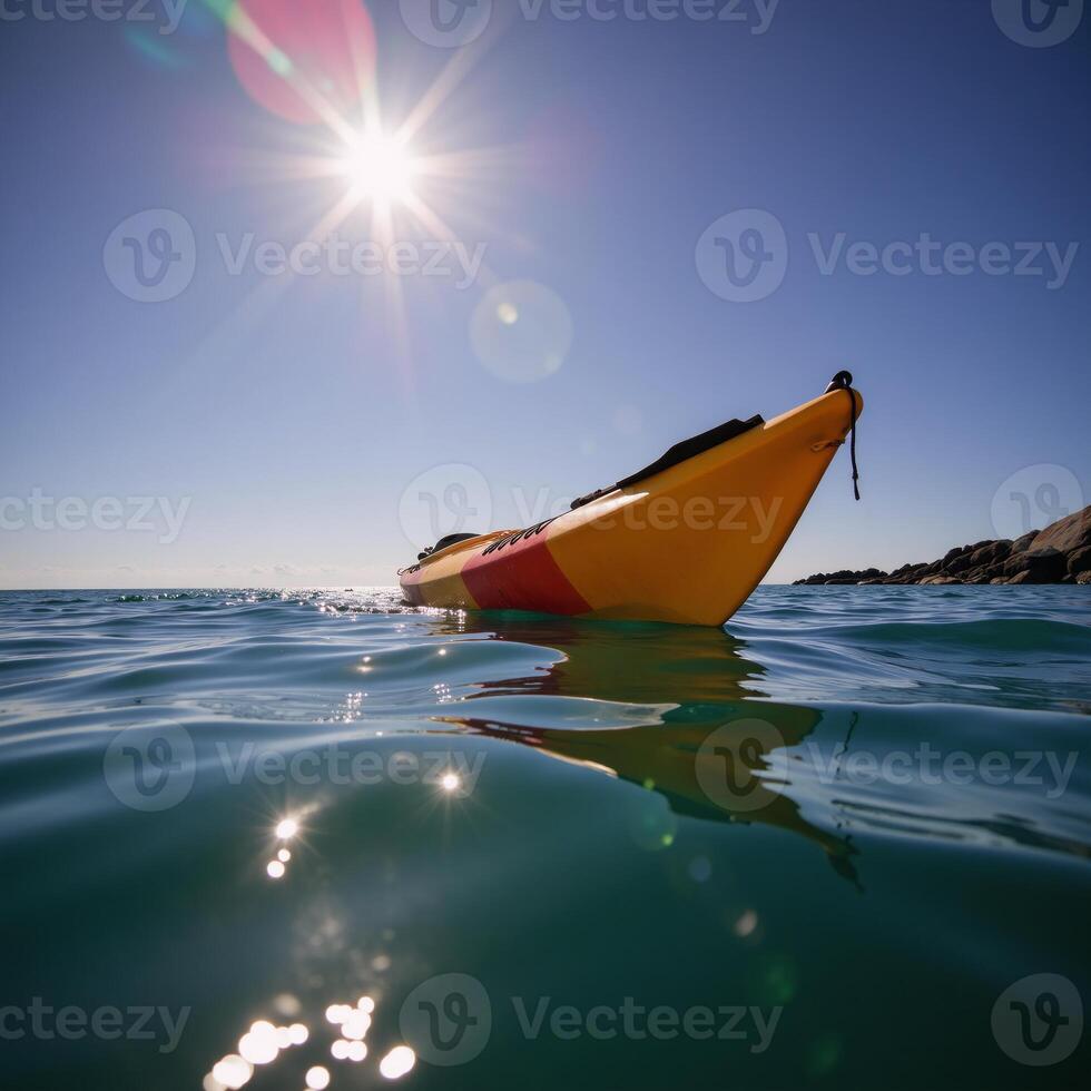 A vibrant kayak floats against a backdrop of both blue and purple waters photo
