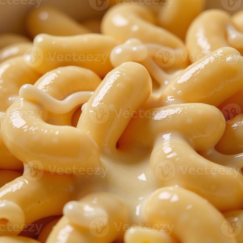 Detailed closeup of macaroni and cheese texture on macro scale photo
