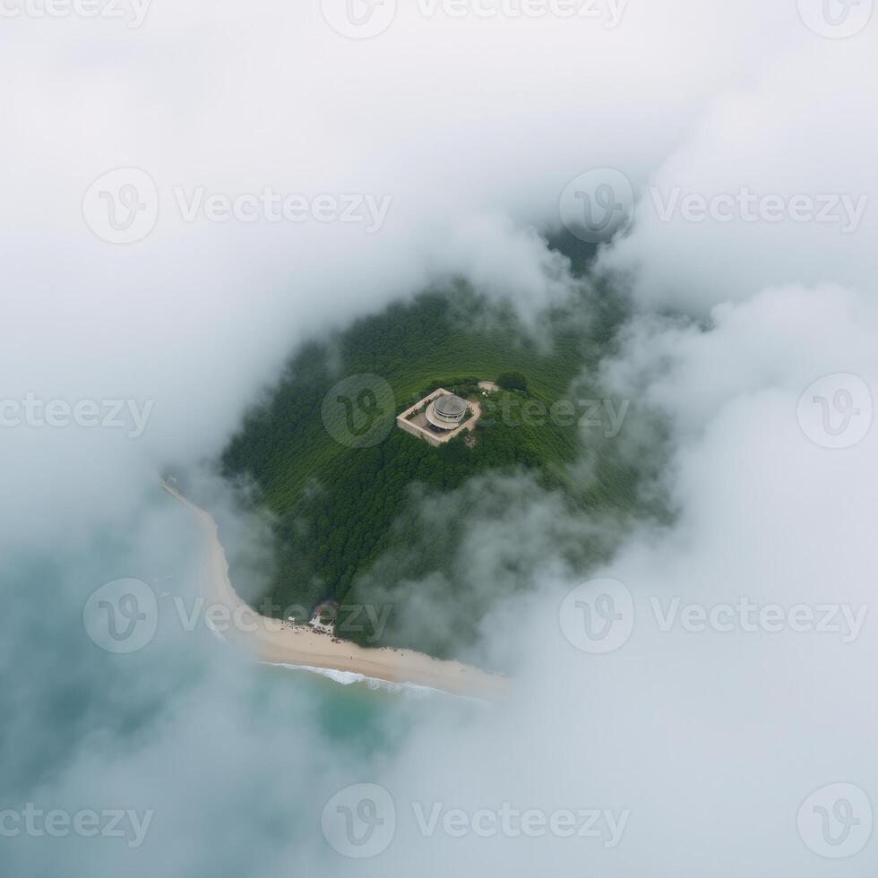 Overview of serene island shrouded in fog calm tranquil photo