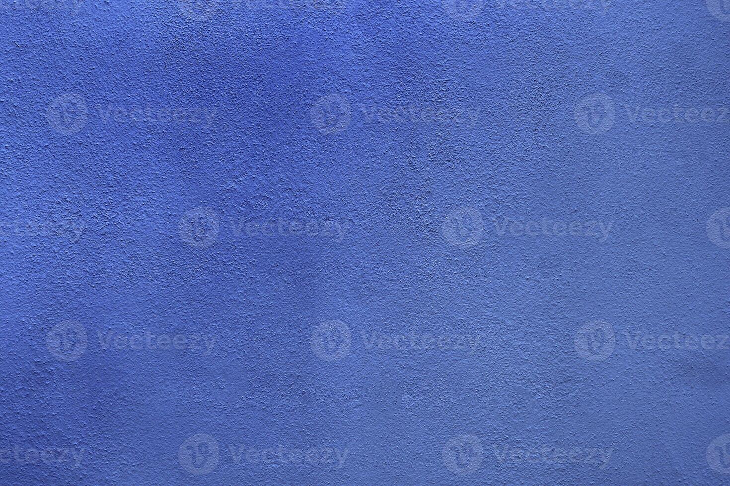 Textured Blue Wall Background with Subtle Variations in Hue for Design and Creative Projects photo
